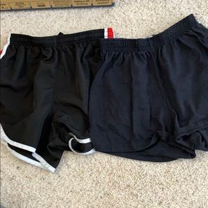 black track shorts and black athletic shorts
